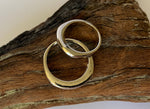 Asymmetrical band ring