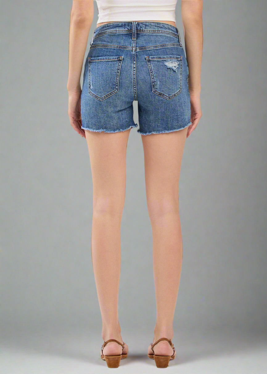 A longer-length denim short with a structured, vintage-inspired appeal-meet the RILEY in Barracuda DK.

- Mid Rise (9.5"): A classic fit that sits comfortably on the waist.
Longer Inseam (21" Leg Opening / 4.5" Inseam): Offers a flattering silhouette with more coverage.
- Comfort Stretch Denim (99% Cotton, 1% Spandex):