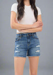 A longer-length denim short with a structured, vintage-inspired appeal-meet the RILEY in Barracuda DK.

- Mid Rise (9.5"): A classic fit that sits comfortably on the waist.
Longer Inseam (21" Leg Opening / 4.5" Inseam): Offers a flattering silhouette with more coverage.
- Comfort Stretch Denim (99% Cotton, 1% Spandex):