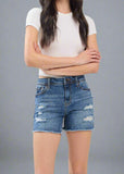A longer-length denim short with a structured, vintage-inspired appeal-meet the RILEY in Barracuda DK.

- Mid Rise (9.5"): A classic fit that sits comfortably on the waist.
Longer Inseam (21" Leg Opening / 4.5" Inseam): Offers a flattering silhouette with more coverage.
- Comfort Stretch Denim (99% Cotton, 1% Spandex):