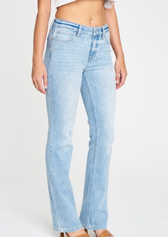 mid rise bootcut jeans in Fanatic. Clean, light wash with five pocket design, light fading, whiskering, and light distressing, and zip fly. This fit features a 9.5 in. mid rise and 32 in. regular inseam.