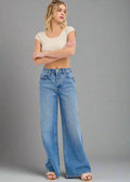 These high-rise wide-leg jeans have a 32" inseam and are the perfect medium wash making them versatile enough to complement any outfit.

Inseam: 32" Rise: 11 1/2"
Fabric Contents
99% Cotton, 1% Spandex