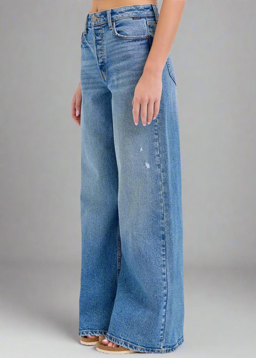 These high-rise wide-leg jeans have a 32" inseam and are the perfect medium wash making them versatile enough to complement any outfit.

Inseam: 32" Rise: 11 1/2"
Fabric Contents
99% Cotton, 1% Spandex