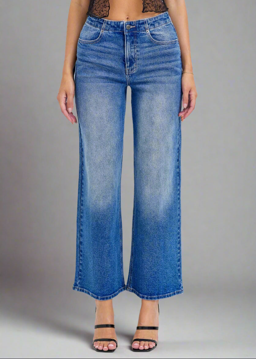 - High-Rise Wide Leg
- Back Lace Details
- Belt loops + Zip fly
- Medium Denim 
- Import
- Inseam 27" Rise: 11 1/2"
- Model is 5'9 wearing size 3
Show Less
Fabric Contents
99% Cotton, 1% Spandex