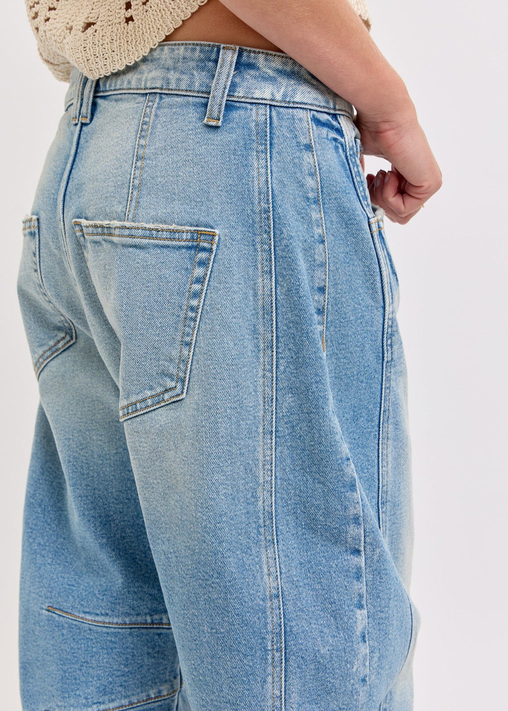 Mid-Waisted Barrel jean
Dart details
Belt loops + Zip fly
Medium denim 
Import
FRONT RISE 11 3/4", INSEAM 27"
Model is 5'8 wearing a size 3
Show Less
Fabric Contents
99% Cotton, 1% Spandex