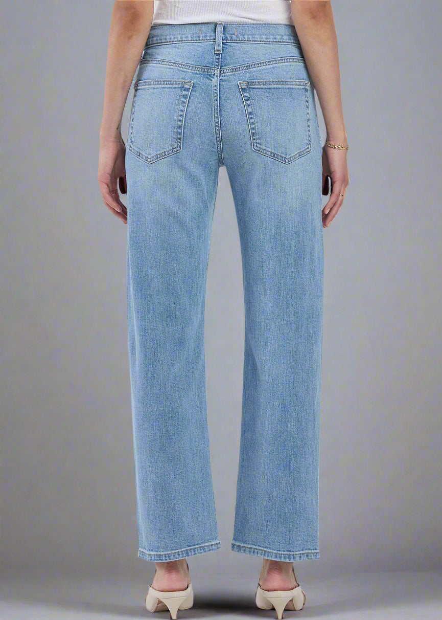 The Danica Mid Rise Bowed Straight in People Pleaser offers a fresh twist on the classic straight-leg silhouette with a trendy bowed shape, providing both comfort and style.	