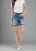 A nod to classic '90s style, the OLIVIA in WOB features an ultra-high rise and relaxed fit for a timeless mom-short silhouette.

- Ultra High Rise (12"): Defines and elongates your figure.
- Longer Inseam (23" Leg Opening / 5" Inseam): Extra coverage for a laid-back, vintage look.
- Comfort Stretch (94% Cotton, 5% Recycled Cotton, 1% Spandex): Sustainable fabric with the perfect amount of give.
- Medium Wash with Destruction: High-low wash and distressed details for a worn-in feel.