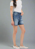 A nod to classic '90s style, the OLIVIA in WOB features an ultra-high rise and relaxed fit for a timeless mom-short silhouette.

- Ultra High Rise (12"): Defines and elongates your figure.
- Longer Inseam (23" Leg Opening / 5" Inseam): Extra coverage for a laid-back, vintage look.
- Comfort Stretch (94% Cotton, 5% Recycled Cotton, 1% Spandex): Sustainable fabric with the perfect amount of give.
- Medium Wash with Destruction: High-low wash and distressed details for a worn-in feel.