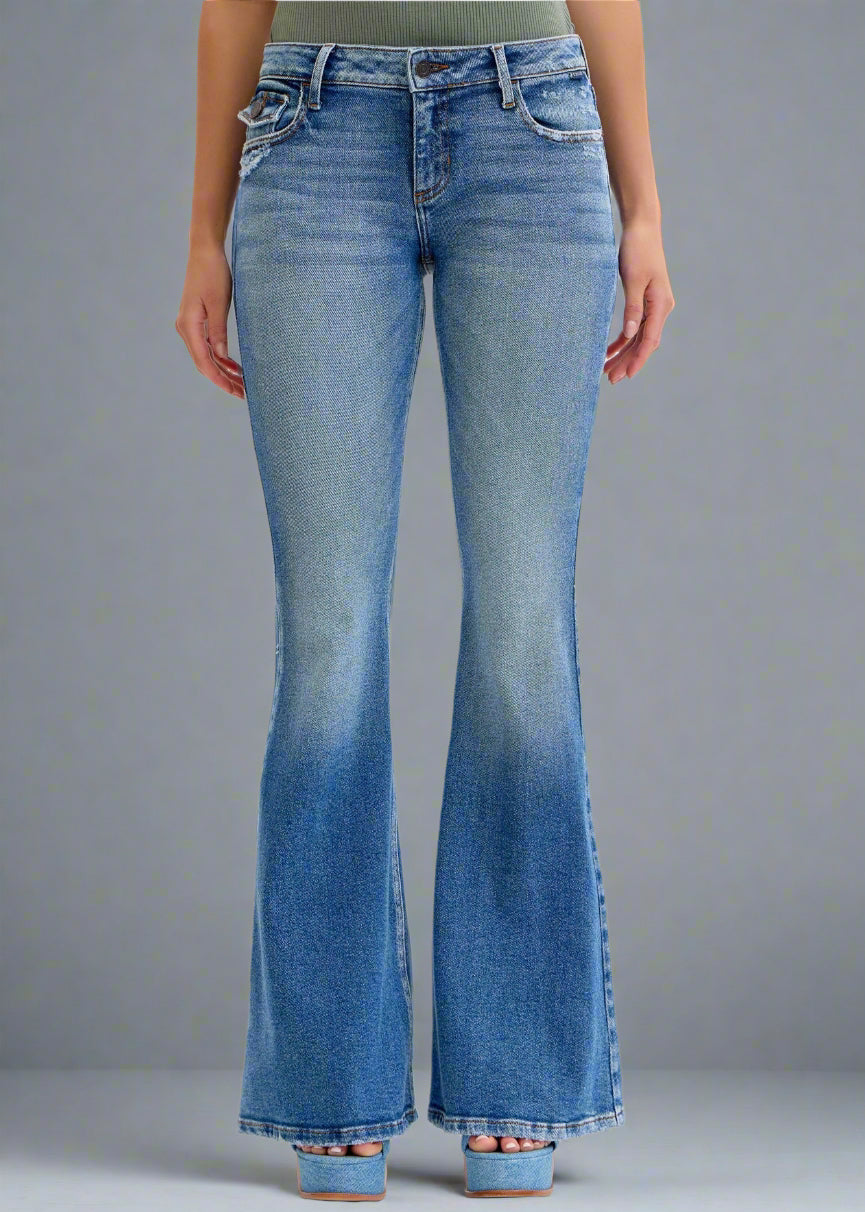 Low-Rise Super Flare
Belt loops + Zip fly
Medium denim 
Import
Rise:7 3/4" Inseam 33"
Fabric Content: 94% Cotton,4% Polyester,2% Spandex
Show Less
Fabric Contents
 94% Cotton,4% Polyester,2% Spandex
