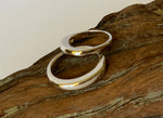 Asymmetrical band ring
